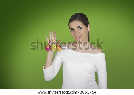 Beautiful easter woman portraits with eggs on the right hand