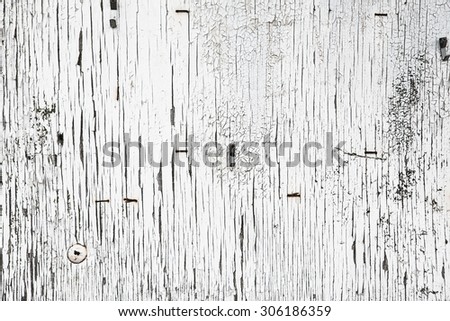 Old painted wall. Grey cracked wall background