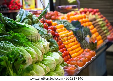 Marketplace with vegetables in Barcelona market, Spain Royalty-Free Stock Photo #306219140