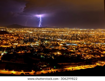 Lightening strike over the city of Queretaro Mexico. In this picture you can see can clearly Los Arcos a historic landmark of the historic town. 