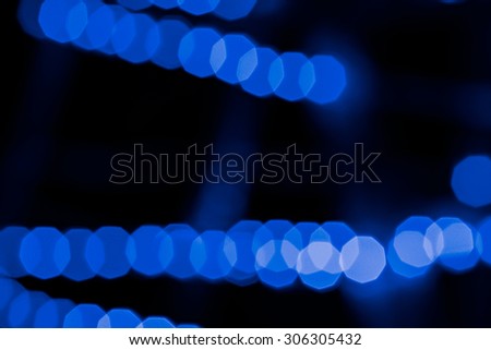 Abstract blue background, circular bokeh, out of focus lights