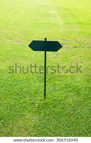 Sign or label in the grass field, Vertical shot