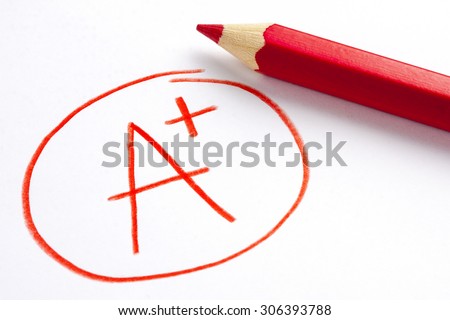 Red Pencil and A Plus Grade Mark  Royalty-Free Stock Photo #306393788