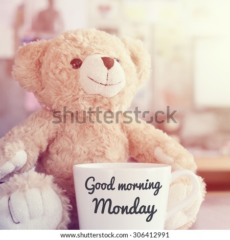 Teddy bear and coffee cup,focused on teddy bear face in Blurred background with vintage filter