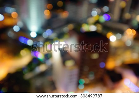 Blur image of a city lights at night with bokeh effect