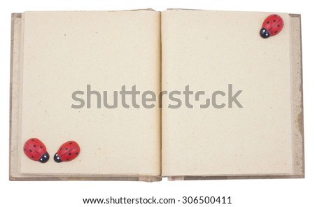 Empty photo album with lady beetle