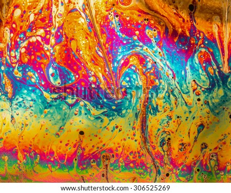 Psychedelic abstract background formed by soap bubble reflecting light Royalty-Free Stock Photo #306525269
