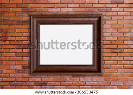 wood frames photo on red brick wall
