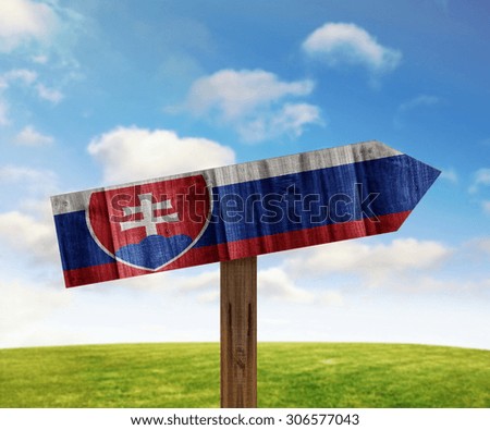 Slovakia wooden direction sign on nature background