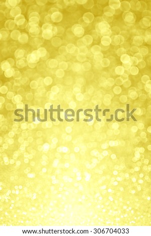 Abstract yellow glitter sparkle bokeh background