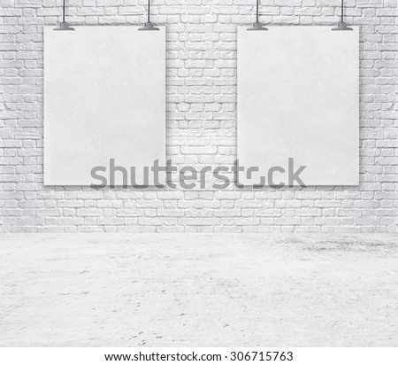 Blank white poster on a rope. brick wall texture use for your add message