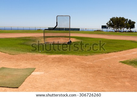 Baseball Field by the Pacific Ocean with a practice net