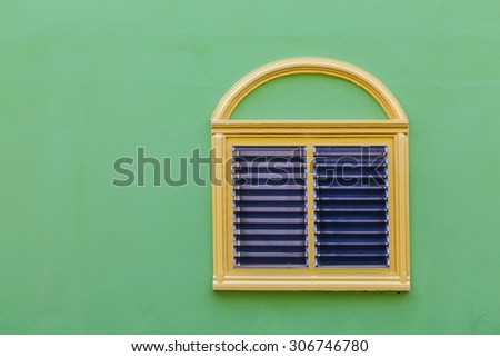yellow window  on green background