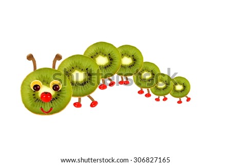 Creative food concept. Funny little  caterpillar made from fruit and vegetables