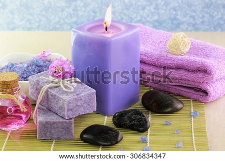 Spa treatment setting with purple theme