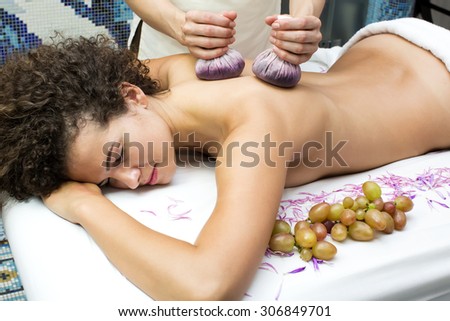 Thai massage bags and grapes in a beauty salon