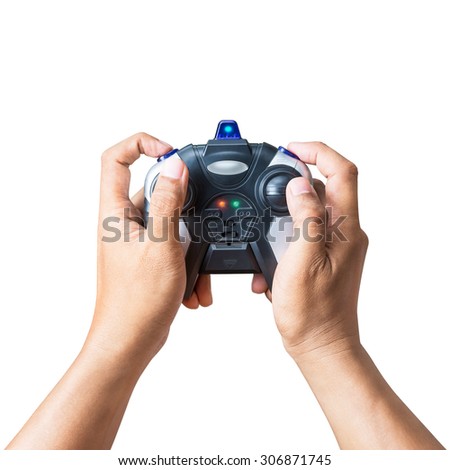 Wireless joystick controller in hand for playing game or toy control isolated on white background with clipping path