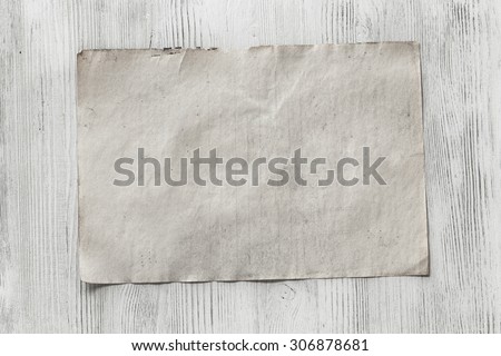 old paper on white wooden background