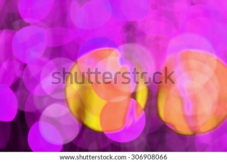 Multicolored de-focused bokeh light background.