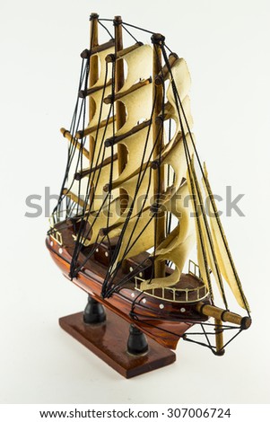 Model wooden ship isolated on white background.