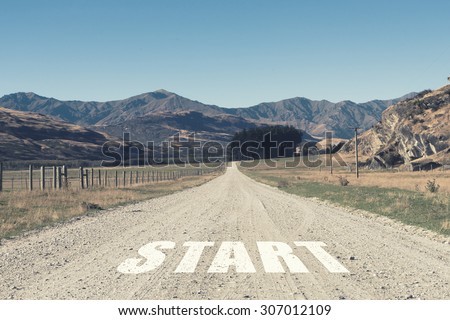 Conceptual image with word start on asphalt road
