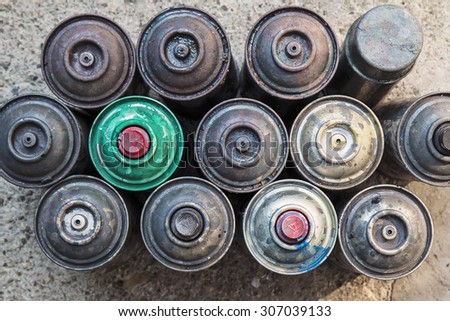 Old used rusty Aerosol Spray cans, ideal background