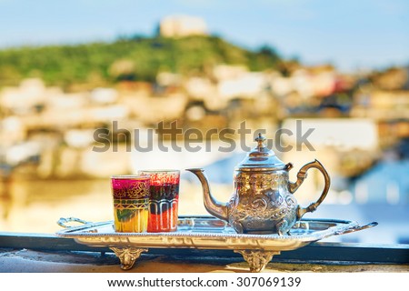 Traditional Moroccan mint tea with sweets Royalty-Free Stock Photo #307069139