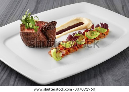Grilled beef steak with potato puree and red lentils Royalty-Free Stock Photo #307091960