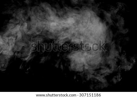 Abstract steam on a black background. Texture. Design element. Abstract art. The steam from the iron. Macro shooting. Royalty-Free Stock Photo #307151186