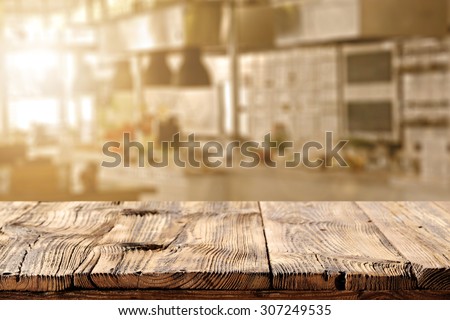 blurred background of kitchen of sun light and dirty table 