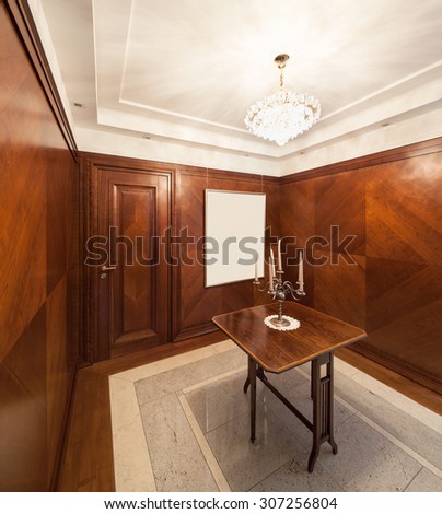 Interior of house, classic style room with walls covered in hardwood