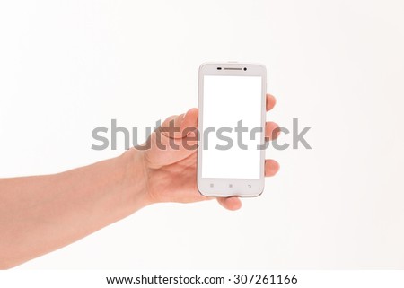 Mobile phone with black touch screen in man's hand. Isolated man's hand holding white phone with black touch screen.