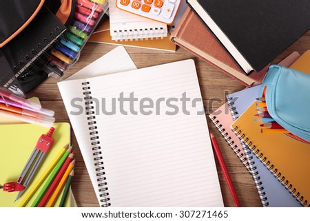 Student desk, blank writing book, equipment, studying homework concept, copy space