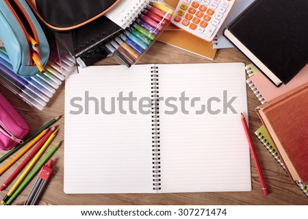 College student desk, open book, blank copy space