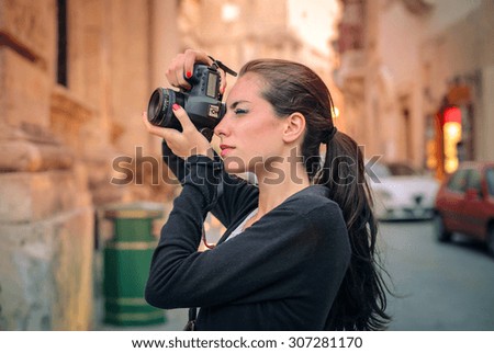 Young photographer taking a picture