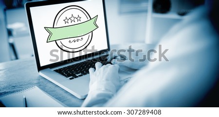Businessman working on his laptop against banner drawing