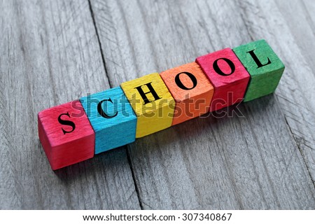 word school on colorful wooden cubes, back to school concept