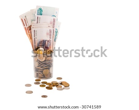 plastic cup with russian coins and banknotes of different dignity on a white background, isolated