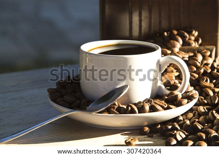 coffee grinder with coffee and coffee beans