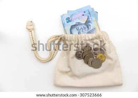 thai banknotes in  money bag  on white background