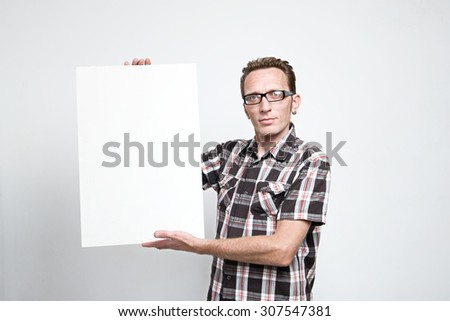 Man displaying a white board