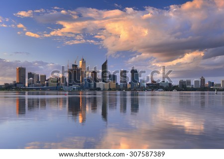 The skyline of Perth, Western Australia at sunset. Photographed from across the Swan River.