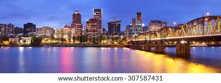 The skyline of Portland, Oregon at night. Photographed from across the Willamette River.