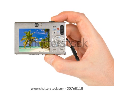 Hand with camera and landscape (my photo) isolated on white background