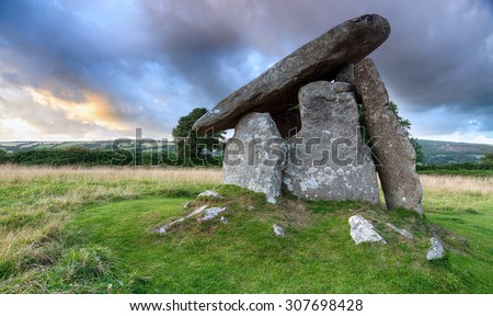 Trethevy Quoit under a moody sky on Bodmin Moor in Cornwall, an impressive Neolithic dolmen burial chamber that stands nearly nine feet tall