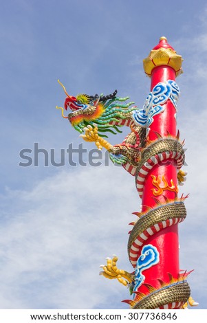 chinese style dragon statue on blue sky background.