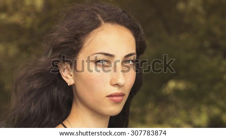 freckles woman portrait in forest