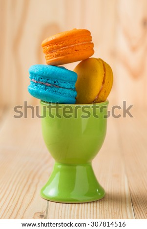 Colorful French Macarons On Wooden background