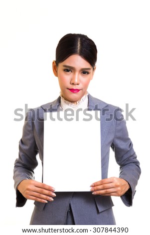 Business woman standing behind a blank board on white background