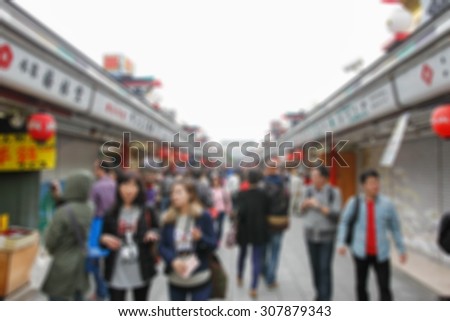 Abstract blurred peoples walking in shopping alley road